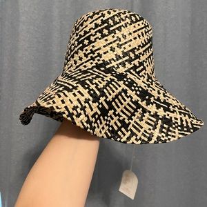 New Hand-woven Bucket Hats: tan, brown and tan, tan and black.